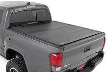 Load image into Gallery viewer, Hard Tri-Fold Flip Up Bed Cover | 5' Bed | Toyota Tacoma 2WD/4WD (2016-2023)