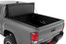 Load image into Gallery viewer, Hard Tri-Fold Flip Up Bed Cover | 5' Bed | Toyota Tacoma 2WD/4WD (2016-2023)