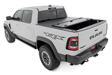 Load image into Gallery viewer, Hard Tri-Fold Flip Up Fold Bed Cover | 5'7" Bed | Ram 1500 (19-26)/1500 TRX (21-24)