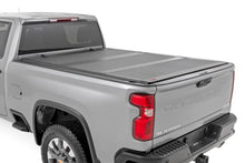 Load image into Gallery viewer, Hard Tri-Fold Flip Up Bed Cover | 6'9" Bed | Chevy/GMC Silverado/Sierra 2500HD/3500HD (20-26)