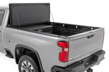 Load image into Gallery viewer, Hard Tri-Fold Flip Up Bed Cover | 6'9" Bed | Chevy/GMC Silverado/Sierra 2500HD/3500HD (20-26)