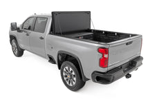 Load image into Gallery viewer, Hard Tri-Fold Flip Up Bed Cover | 6'9" Bed | Chevy/GMC Silverado/Sierra 2500HD/3500HD (20-26)