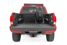 Load image into Gallery viewer, Bed Mount Spare Tire Carrier | Universal | Multiple Makes &amp; Models (Chevy/Dodge/Ford/GMC/Ram)